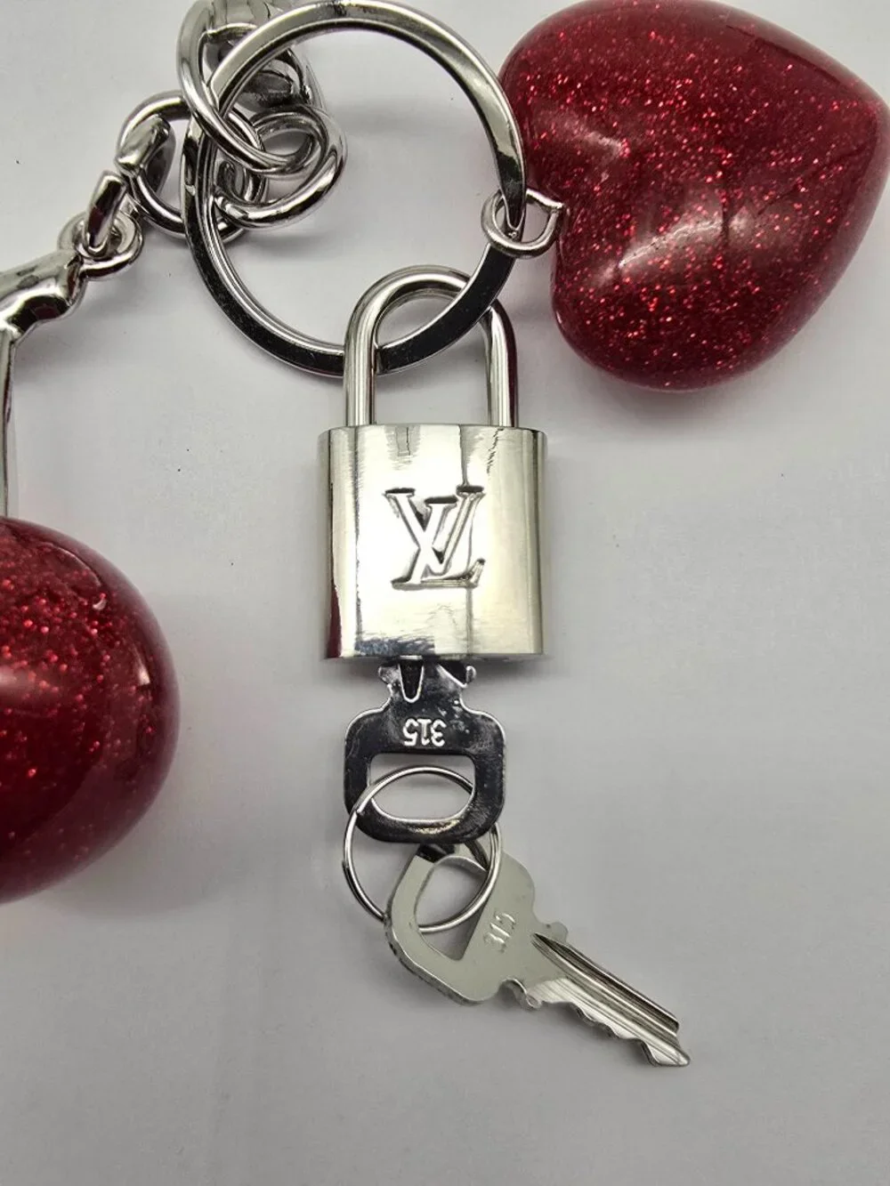 Authentic Louis Vuitton Silver Padlock with Unbranded Red Cherry Charm